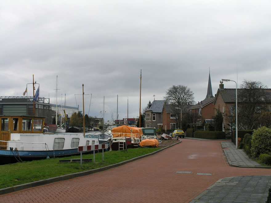 De RK toren en Huis van Roosjen nu nog te herkennen